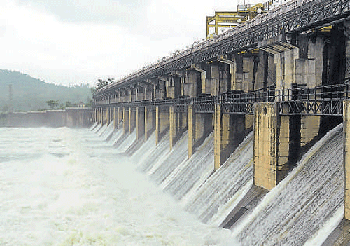 Water being released from the Tunga reservoir at Gajanur near Shimoga on Friday.