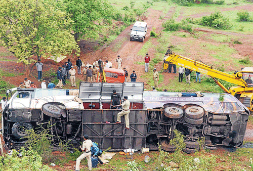 Fatal roll The mangled remains of the Volvo bus which rolled down from a height near Itagatti village on the Hubli-Dharwad by-pass near Dharwad on Friday morning. KPN