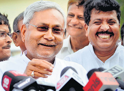 Bihar Chief Minister Nitish Kumar interacts with media at the airport in Patna on Friday. PTI