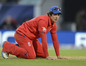 England's captain Alastair Cook is seen on the ground during the ICC Champions Trophy group A match against Sri Lanka at The Oval cricket ground in London June 13, 2013. REUTERS