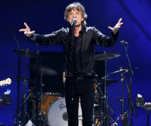 Mick Jagger of the Rolling Stones performs in concert at the TD Garden arena on Wednesday, June 12, 2013 in Boston. (Photo by AP)