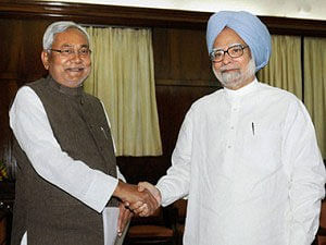 Nitish Kumar and Manmohan Singh. PTI File Image.