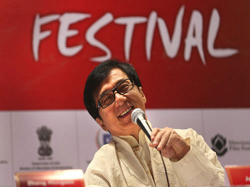 Chinese Hollywood actor Jackie Chan talks during a press conference at the opening of the Chinese film festival, in New Delhi, India, Tuesday, June 18, 2013. (AP Photo
