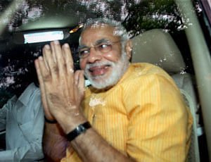 Gujarat Chief Minister of Narendra Modi leaves after meeting with senior BJP leader L K Advani in New Delhi on Tuesday. PTI Photo