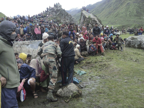 Members of the Indian Army gather stranded tourists and villagers who were rescued in the Himalayan state of Uttarakhand. Reuters