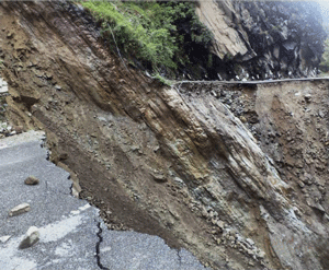 An aerial view of a washed off road after cloud burst and incessant rains in Chamoli, Uttarakhand, on Tuesday. PTI Photo