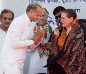 UPA Chairperson Sonia Gandhi is greeted with a shawl by Rajasthan Chief Minister Ashok Gehlot during foundation stone laying of two units of super critical thermal power station at Suratgarh on Thursday. PTI Photo