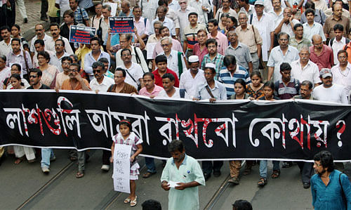 Intellectuals and common people protesting against recent remarks of West Bengal Chief Minister Mamata Banerjee on increasing crimes on women in the State, in Kolkata on Fariday. PTI Photo.