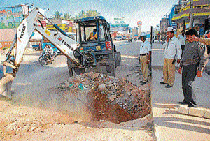 Apathy in recovering  encroached land angers minister