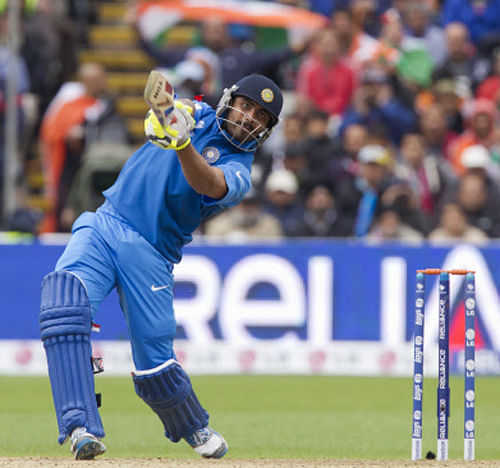 India's Ravindra Jadeja plays a shot off the bowling of England's James Anderson during their ICC Champions Trophy Final cricket match at Edgbaston cricket ground, Birmingham, England, Sunday June 23, 2013. AP Photo.