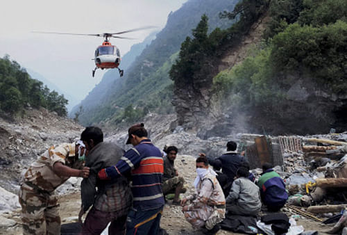 ITBP jawans during recent rescue operations in the flood-hit areas of Govindghat, Uttarakhand. PTI Photo.