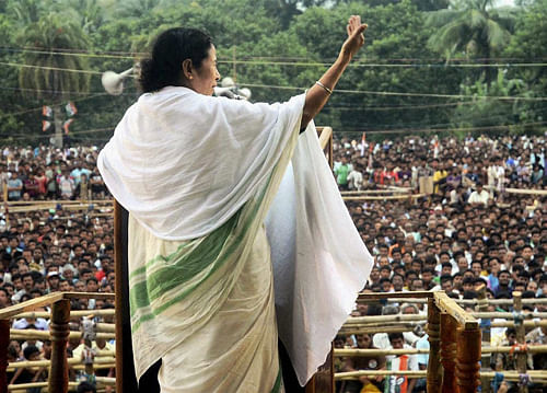 West Bengal Chief Minister and Trinamool Congress supremo Mamata Banerjee addresses during her party election campaign for the upcoming Panchayat polls at Duttapukur in North 24 Parganas district of West Bengal on Wednesday. PTI Photo