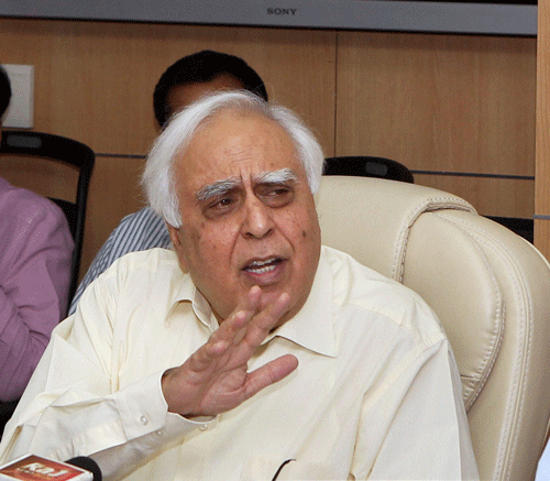Union Minister for Communication and Information Technology, Kapil Sibal, speaks to media during the launch of 'e- Gov Appstore' in New Delhi on Friday. PTI Photo.