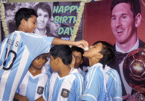 Little fans of Argentina's football star Lionel Messi celebrate his 26th birthday in Kolkata on Monday. PTI Photo