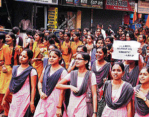 Taking to streets: Students take part in a rally against the gang-rape of a medical student  at Manipal, in Udupi on Monday . KPN