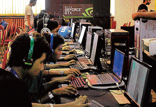 Engaging: Gaming buffs stick to their desktop for LAN party and game tournaments.