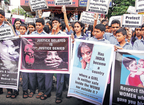 voices of protest: Students protest against the alleged gang-rape of a medical student in Manipal, on Tuesday. KPN