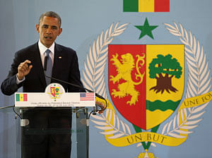 President Barack Obama gestures during a news conference with Senegalese President Macky Sall at the Presidential Palace in Dakar, Senegal, Thursday, June 27, 2013. Obama is visiting Senegal, South Africa, and Tanzania on a week long trip. AP Photo