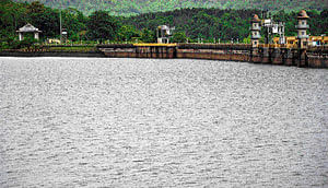 Bounty: Water in the Harangi Dam in Kodagu is nearing the maximum level following copious rainfall in the catchment areas of River Cauvery. dh photo