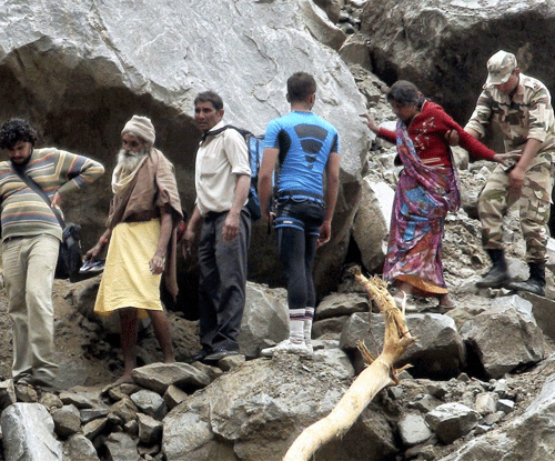 The Supreme Court today asked the Uttarakhand government not to force people, caught in flash floods, to walk long distances. PTI File Photo.