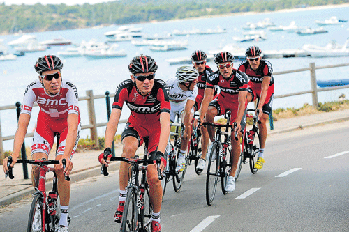 picturesque: Switzerland's BMC Racing Team ride along the Porto Vecchio coast on Friday on the eve of the start of the Tour de France. AP