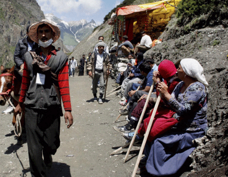The first batch of Amarnath pilgrims on way to the holy cave shrine, at Baltal on Friday. PTI Photo