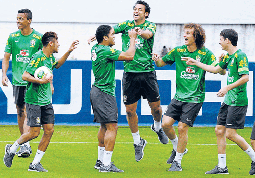 fun and Frolic: Brazilian players have a good time during a practice session ahead of the final against Spain. REUTERS
