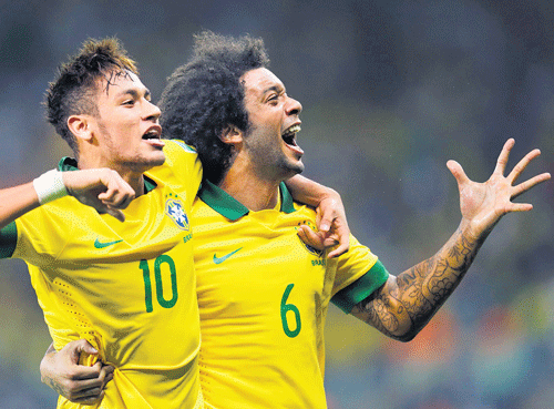 rising again: Neymar (left) and Marcelo celebrate a Brazilian win at the Confederations Cup. reuters