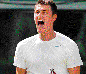 i did it: Australia's Bernard Tomic exults during his third round win over Frenchman Richard Gasquet at the Wimbledon in London on Saturday. afp