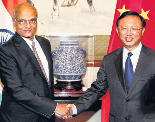 India's National Security Adviser Shiv Shankar Menon with Chinese Special Representative Yang Jiechi in Beijing. pti