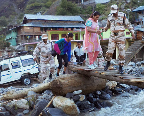 ITBP personnel rescuing people in Badrinath, Uttakhand. PTI Photo