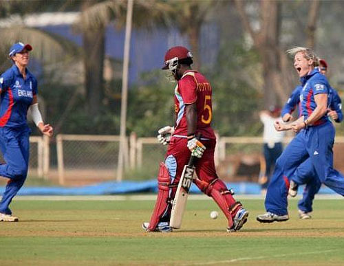 England players celebrate the dismissal of a West Indies wicket during their match at the ICC Women's World Cup 2013 held in Mumbai .Photo: PTI