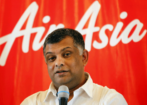 Group CEO of AirAsia Tony Fernandes speaks during a press conference in Mumbai, India, Friday, July 1, 2013. AirAsia is all set to launch a low-cost airline in association with the Tata Group this year, according to local news reports. AP photos