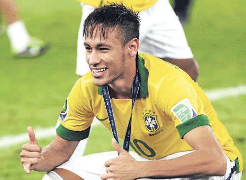 mercurial Brazil's Neymar poses for a photo after  winning the player of the tournament award. reuters