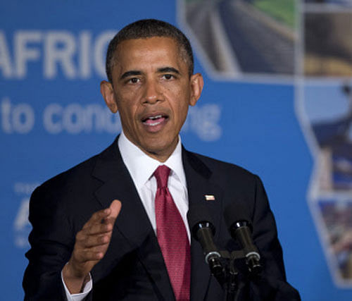 President Barack Obama gestures while speaking at a business forum aimed at increasing investment in Africa, Monday, July 1, 2013, in Dar Es Salaam, Tanzania. AP Photo