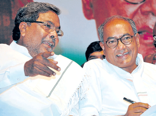 talking heads: Chief Minister Siddaramaiah and Digvijay Singh, AICC general secretary in-charge of Karnataka at the KPCC general body meeting in Bangalore on Tuesday. DH Photo