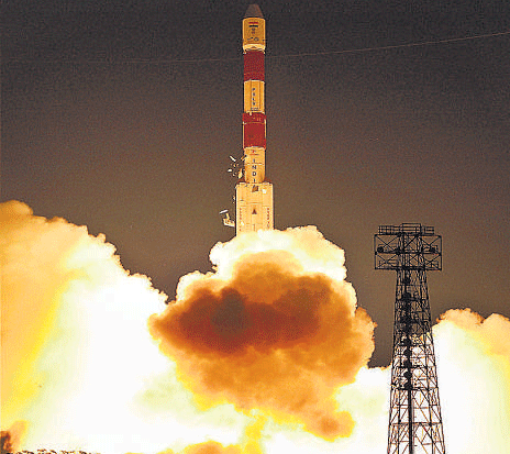 PSLV-C22, carrying India's first navigation satellite, IRNSS-1A, takes off in Sriharikota. PTI
