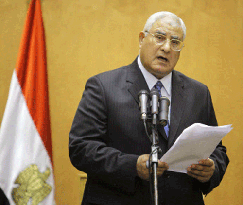 Egypt's chief justice Adly Mansour speaks at his swearing in ceremony as the nation's interim president, Thursday, July 4, 2013. The chief justice of Egypt's Supreme Constitutional Court was sworn in Thursday as the nation's interim president, taking over hours after the military ousted the Islamist President Mohammed Morsi.(AP Photo