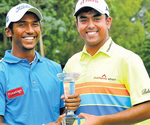 Two to tango: Anirban Lahiri (right), winner of the Eagleburg Open, and Chikkarangappa, runner-up, at the Eagleton Golf Resort on Friday. dh photo / srikanta sharma R