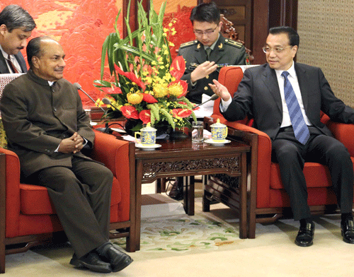 Defence Minister A K Antony and Chinese Premier Li Keqiang at a meeting in Beijing on Friday. PTI Photo