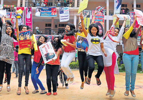 energetic: Students went out of their way to promote their candidates. DH Photos by S K Dinesh