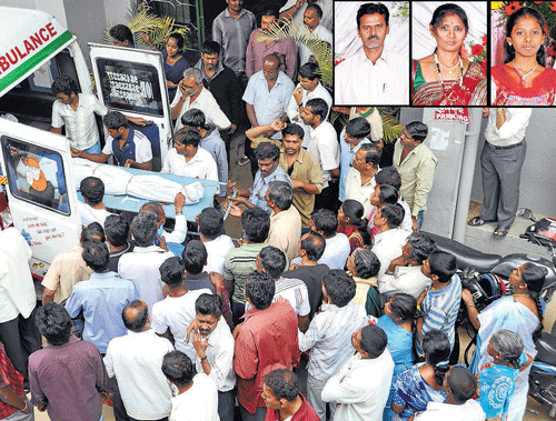 Gruesome task: The bodies of three members of a family killed in the accident being shifted to KIMS for postmortem, on Monday. (Inset ) the deceased Dakshina Murty, his wife Nagaveni and their daughter Aishwarya .  dh photo