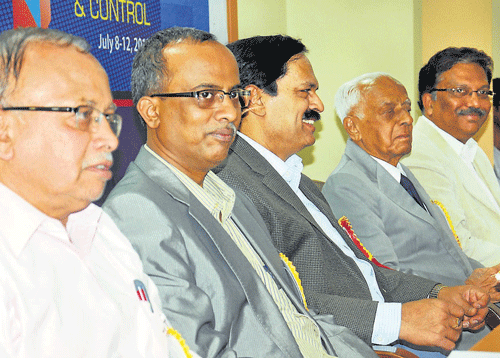 Secretary of NIE S L Ramachandra, General Manager of PRDC, Bangalore, K Balaram, Director (Technical) of MESCOM, Mangalore, W M Shivakumar, President of NIE Board of Management S R Subba Rao and Principal G L Shekar during the inauguration of a workshop on 'Recent Trends in Power System Operation and Control' at NIE Golden Jubilee Block in Mysore, on Monday. DH Photo