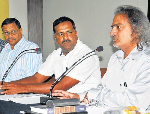 Commissioner of the Department of Health and Family Welfare, V B Patil, Minister U T Khader and Principal Secretary Madan Gopal at the Mysore division meeting of Health and Family Welfare Department, in Mysore on Tuesday. dh photo