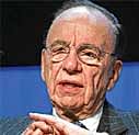 Murdoch recalled by British lawmakers over police comments