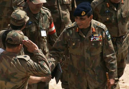 Pakistani Army Chief Ashfaq Parvez Kayani (R) shakes hands with army officers as he arrives to attend a military exercise in Bahawalpur, in Pakistan's Punjab province, April 18, 2010.  Credit: Reuters/