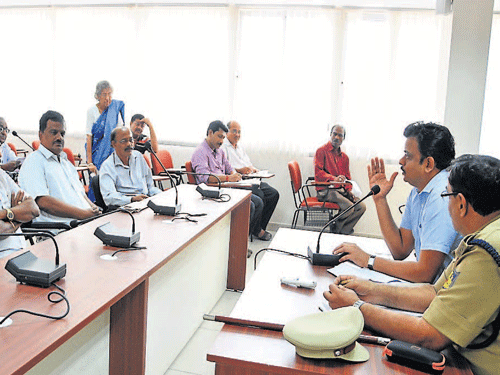 RTO C&#8200;Mallikarjuna speaking at the Transport Adalat at RTO Office in Mangalore on Wednesday. DH photo