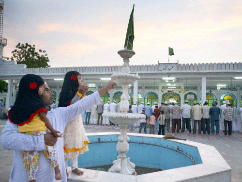 A family seeks blessing on the eve Ramzan Jodhpur ; A family seeks blessing on the eve Ramzan Ul Mubarak month at Idgah in Jodhpur on Wednesday. PTI Photo