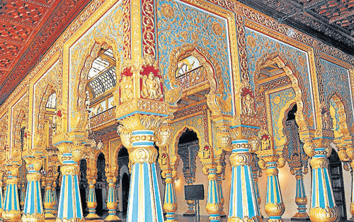 The gold leaf works that were carried out on pillars in the  private durbar hall of Amba Vilas Palace. DH PHOTo