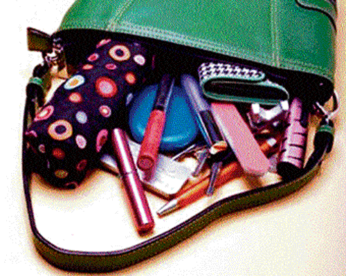 Stuffed: Women carry too many things in their bags.